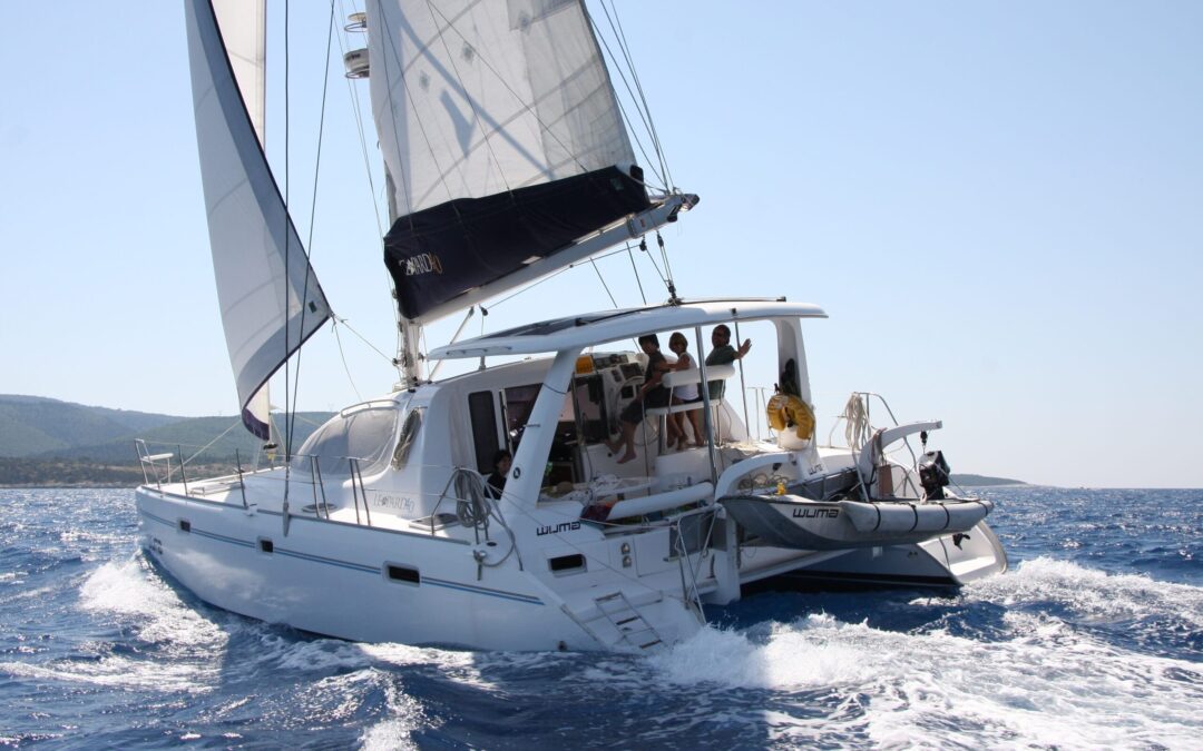 The Catamaran Boom by Angela Collins Yachts